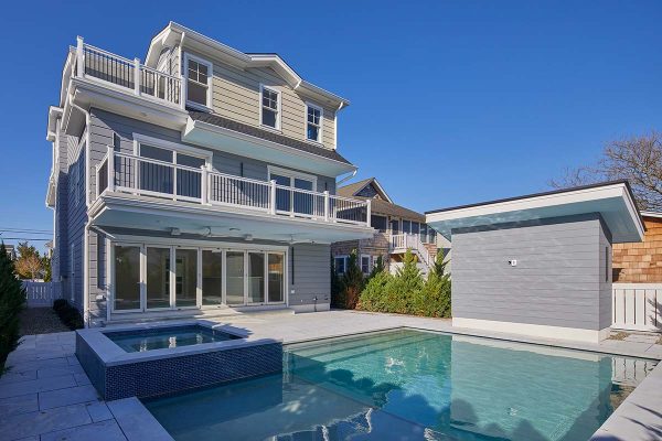 Back of custom home built in Avalon, NJ with pool
